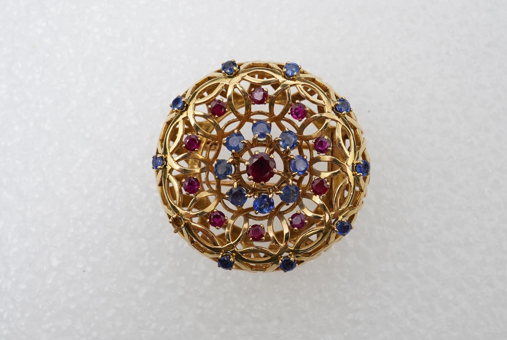 Mellerio dits Meller, a ruby and sapphire brooch, mid 20th century